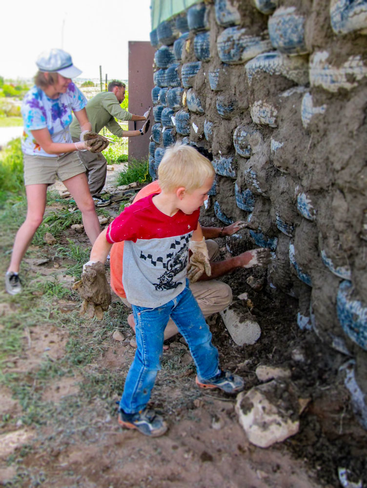 group-job-building-wall-out-of-recycled-tires